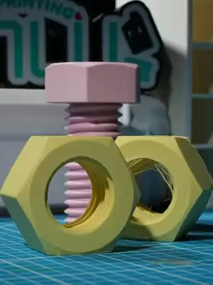 The hidden challenge of printing nuts: internal threads. 🔩 Filament: High Speed Matte PLA Lemon Yellow/Sakura Pink Model from MakerWorld: Makidev #sunlu #3dprinting #tips #3dprintinglife #3dprintingti