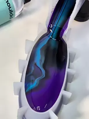 This galaxy bowl is pure magic 💜💫 Made using our ‘Galaxy Oval Bowl Starter Bundle’ 👀 #resinart #resinpour #moulddresin #viralhomedecor #galaxy 
