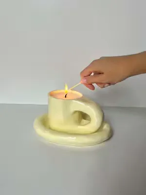 A yellow mug candle is the way to go for Spring 🌼🍋  #pottery #airdryclay #giftideas #DIY #craft 