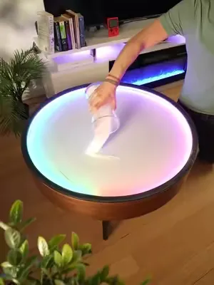 The Oasis Coffee Table crafts a graceful koi, bringing zen garden tranquility to your living space.