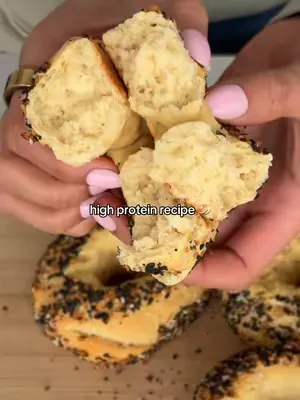 Stop buying bagels! Make these instead 😏 🥯 Recipe: 1. Preheat oven to 375°F (190°C) and line a baking sheet with parchment paper. 2. In the bowl of an electric mixer, combine 1 cup self-raising flour,