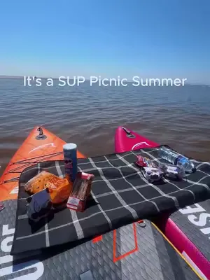 Snacks taste better on the water 🥪🌊 #paddleboarding #suppicnic #summeractivities
