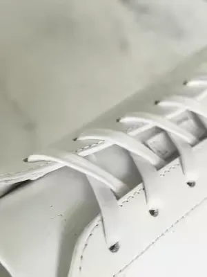 Hand-painted edges. Only on Koios.